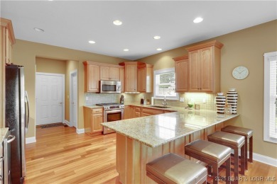 An absolute must-see, professionally decorated and furnished by on The Club At Porto Cima in Missouri - for sale on GolfHomes.com, golf home, golf lot