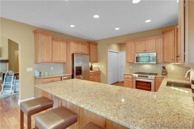 An absolute must-see, professionally decorated and furnished by on The Club At Porto Cima in Missouri - for sale on GolfHomes.com, golf home, golf lot