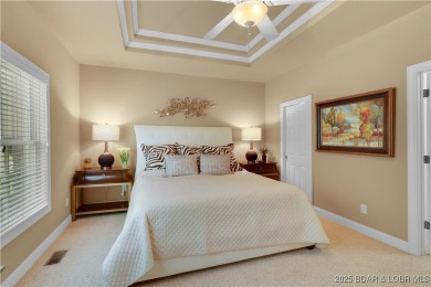 An absolute must-see, professionally decorated and furnished by on The Club At Porto Cima in Missouri - for sale on GolfHomes.com, golf home, golf lot