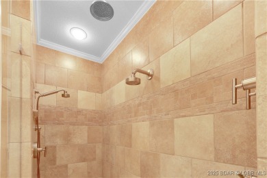 An absolute must-see, professionally decorated and furnished by on The Club At Porto Cima in Missouri - for sale on GolfHomes.com, golf home, golf lot