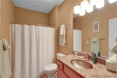 An absolute must-see, professionally decorated and furnished by on The Club At Porto Cima in Missouri - for sale on GolfHomes.com, golf home, golf lot