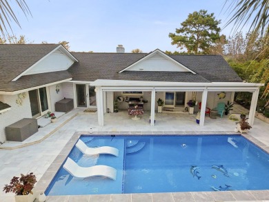 Welcome to this remarkable ranch-style residence, perfectly on Myrtlewood Golf Course and Club  in South Carolina - for sale on GolfHomes.com, golf home, golf lot