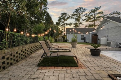 Welcome to this remarkable ranch-style residence, perfectly on Myrtlewood Golf Course and Club  in South Carolina - for sale on GolfHomes.com, golf home, golf lot