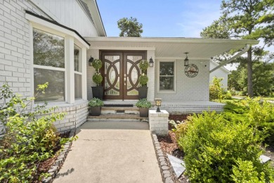 Welcome to this remarkable ranch-style residence, perfectly on Myrtlewood Golf Course and Club  in South Carolina - for sale on GolfHomes.com, golf home, golf lot