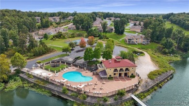 An absolute must-see, professionally decorated and furnished by on The Club At Porto Cima in Missouri - for sale on GolfHomes.com, golf home, golf lot