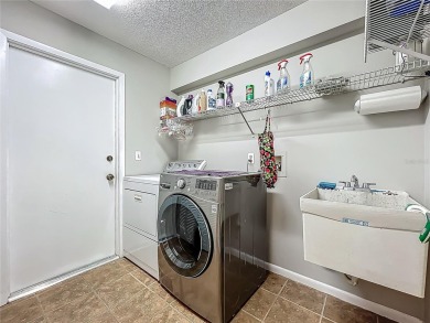 This one literally has it all! PRIME location in the heart of on Seven Springs Golf and Country Club in Florida - for sale on GolfHomes.com, golf home, golf lot