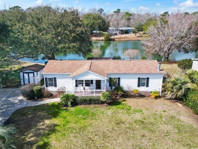 Beautiful 3 bedroom 2 bath home on one of the most peaceful lake on Wachesaw Plantation East Golf Course in South Carolina - for sale on GolfHomes.com, golf home, golf lot