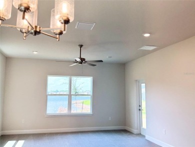 This Stunning Home features 4 bedrooms, 2.5 baths, and a bright on Harmony Golf Preserve in Florida - for sale on GolfHomes.com, golf home, golf lot
