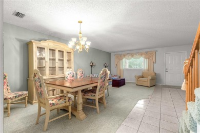 SPACIOUS Two-Level Townhome located in the Americana on On Top of the World Golf Course in Florida - for sale on GolfHomes.com, golf home, golf lot