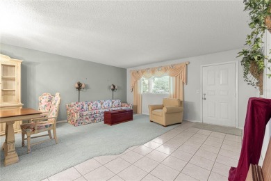 SPACIOUS Two-Level Townhome located in the Americana on On Top of the World Golf Course in Florida - for sale on GolfHomes.com, golf home, golf lot