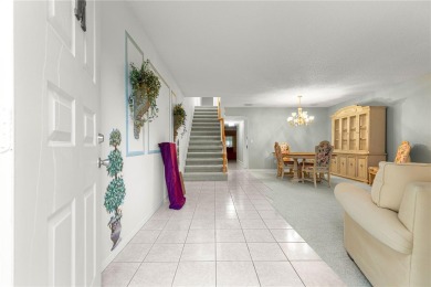 SPACIOUS Two-Level Townhome located in the Americana on On Top of the World Golf Course in Florida - for sale on GolfHomes.com, golf home, golf lot