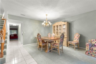 SPACIOUS Two-Level Townhome located in the Americana on On Top of the World Golf Course in Florida - for sale on GolfHomes.com, golf home, golf lot
