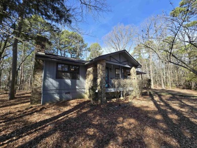 This beautifully updated 2-bedroom, 1.5-bathroom home boasts a on Mountain Ranch Golf Club in Arkansas - for sale on GolfHomes.com, golf home, golf lot