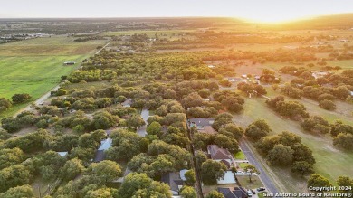 Are you looking for a BRAND NEW home within walking distance to on Devine Golf Course in Texas - for sale on GolfHomes.com, golf home, golf lot