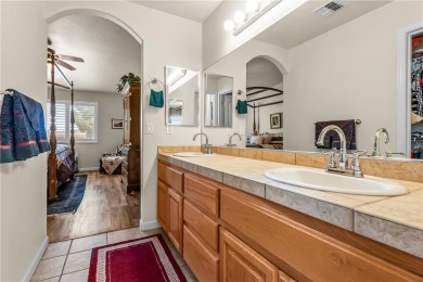 Welcome to this beautifully maintained 1,814 sqft single-story on Desert Lakes Golf Course in Arizona - for sale on GolfHomes.com, golf home, golf lot