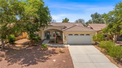 Welcome to this beautifully maintained 1,814 sqft single-story on Desert Lakes Golf Course in Arizona - for sale on GolfHomes.com, golf home, golf lot