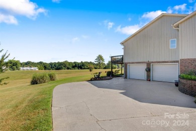 Nestled in Granada Farms, this 3 bed, 2 bath home offers on Granada Farms Country Club in North Carolina - for sale on GolfHomes.com, golf home, golf lot