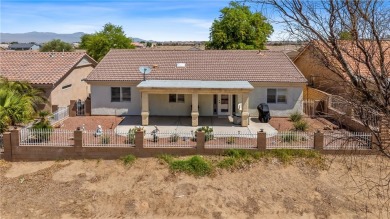 Welcome to this beautifully maintained 1,814 sqft single-story on Desert Lakes Golf Course in Arizona - for sale on GolfHomes.com, golf home, golf lot