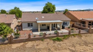 Welcome to this beautifully maintained 1,814 sqft single-story on Desert Lakes Golf Course in Arizona - for sale on GolfHomes.com, golf home, golf lot