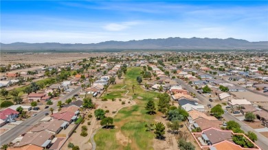 Welcome to this beautifully maintained 1,814 sqft single-story on Desert Lakes Golf Course in Arizona - for sale on GolfHomes.com, golf home, golf lot