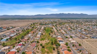 Welcome to this beautifully maintained 1,814 sqft single-story on Desert Lakes Golf Course in Arizona - for sale on GolfHomes.com, golf home, golf lot
