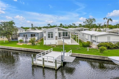WATERFRONT LIVING | Fully Furnished | 2021 Palm Harbor Home
 on Mangrove Bay Golf Course in Florida - for sale on GolfHomes.com, golf home, golf lot