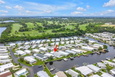 WATERFRONT LIVING | Fully Furnished | 2021 Palm Harbor Home
 on Mangrove Bay Golf Course in Florida - for sale on GolfHomes.com, golf home, golf lot