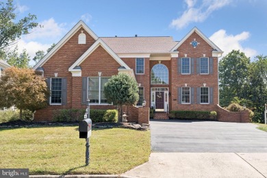 Nestled in a serene cul-de-sac in the sought-after gated on Dominion Valley Country Club in Virginia - for sale on GolfHomes.com, golf home, golf lot