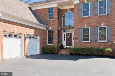 Nestled in a serene cul-de-sac in the sought-after gated on Dominion Valley Country Club in Virginia - for sale on GolfHomes.com, golf home, golf lot