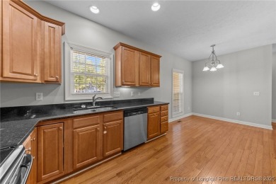 Welcome to this wonderful home in the highly sought-after on Woodlake Country Club in North Carolina - for sale on GolfHomes.com, golf home, golf lot