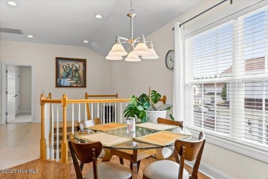 This inviting second-floor condo in the gated community of on Brunswick Plantation and Golf Resorts in North Carolina - for sale on GolfHomes.com, golf home, golf lot