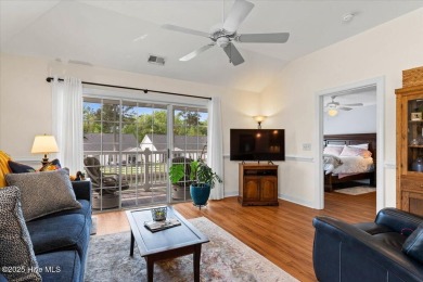 This inviting second-floor condo in the gated community of on Brunswick Plantation and Golf Resorts in North Carolina - for sale on GolfHomes.com, golf home, golf lot