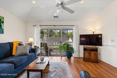 This inviting second-floor condo in the gated community of on Brunswick Plantation and Golf Resorts in North Carolina - for sale on GolfHomes.com, golf home, golf lot