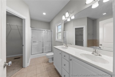 Welcome to this wonderful home in the highly sought-after on Woodlake Country Club in North Carolina - for sale on GolfHomes.com, golf home, golf lot