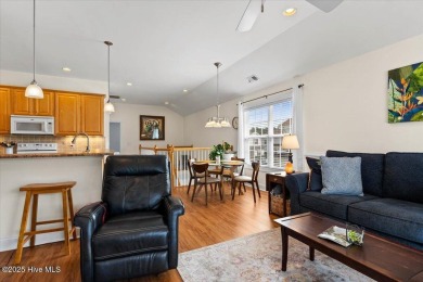 This inviting second-floor condo in the gated community of on Brunswick Plantation and Golf Resorts in North Carolina - for sale on GolfHomes.com, golf home, golf lot