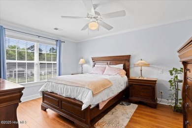 This inviting second-floor condo in the gated community of on Brunswick Plantation and Golf Resorts in North Carolina - for sale on GolfHomes.com, golf home, golf lot