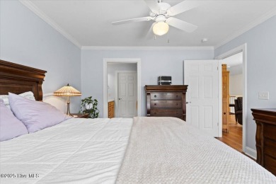This inviting second-floor condo in the gated community of on Brunswick Plantation and Golf Resorts in North Carolina - for sale on GolfHomes.com, golf home, golf lot