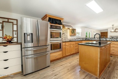 Don't miss this fantastic opportunity to own a spacious on Sharks Tooth Golf Club in Florida - for sale on GolfHomes.com, golf home, golf lot