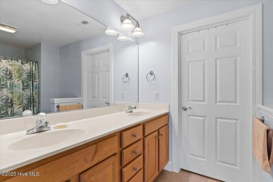 This inviting second-floor condo in the gated community of on Brunswick Plantation and Golf Resorts in North Carolina - for sale on GolfHomes.com, golf home, golf lot