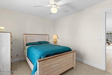 This inviting second-floor condo in the gated community of on Brunswick Plantation and Golf Resorts in North Carolina - for sale on GolfHomes.com, golf home, golf lot