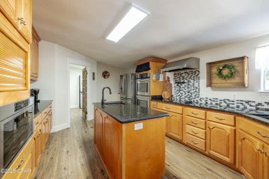 Don't miss this fantastic opportunity to own a spacious on Sharks Tooth Golf Club in Florida - for sale on GolfHomes.com, golf home, golf lot