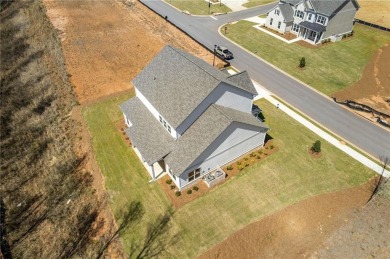 Welcome to your dream home at 3257 Traditions Way, a beautifully on Traditions of Braselton Golf Club in Georgia - for sale on GolfHomes.com, golf home, golf lot
