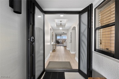 Enjoy elegant waterfront living in Palmas Del Sol, a luxury on Gulf Harbour Yacht and Country Club in Florida - for sale on GolfHomes.com, golf home, golf lot