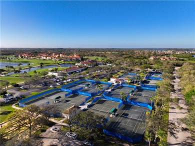 Step into serenity at this lakeside paradise nestled within the on Oak Harbor Country Club in Florida - for sale on GolfHomes.com, golf home, golf lot