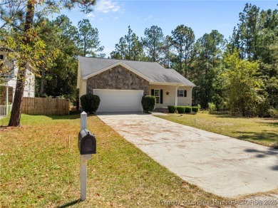 Welcome to this wonderful home in the highly sought-after on Woodlake Country Club in North Carolina - for sale on GolfHomes.com, golf home, golf lot