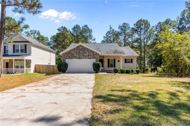 Welcome to this wonderful home in the highly sought-after on Woodlake Country Club in North Carolina - for sale on GolfHomes.com, golf home, golf lot