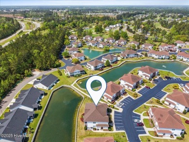 This inviting second-floor condo in the gated community of on Brunswick Plantation and Golf Resorts in North Carolina - for sale on GolfHomes.com, golf home, golf lot
