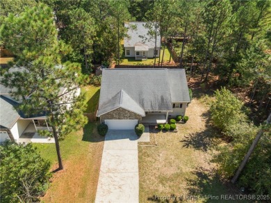 Welcome to this wonderful home in the highly sought-after on Woodlake Country Club in North Carolina - for sale on GolfHomes.com, golf home, golf lot
