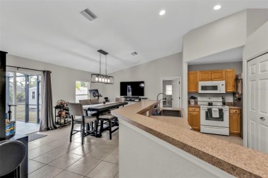 This meticulously maintained pool home is set on a spacious on Bobcat Trail Golf Club in Florida - for sale on GolfHomes.com, golf home, golf lot