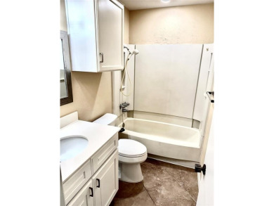 Fall in love with this spacious 2-bedroom, 2-bathroom condo four on Stevens Park Golf Course in Texas - for sale on GolfHomes.com, golf home, golf lot